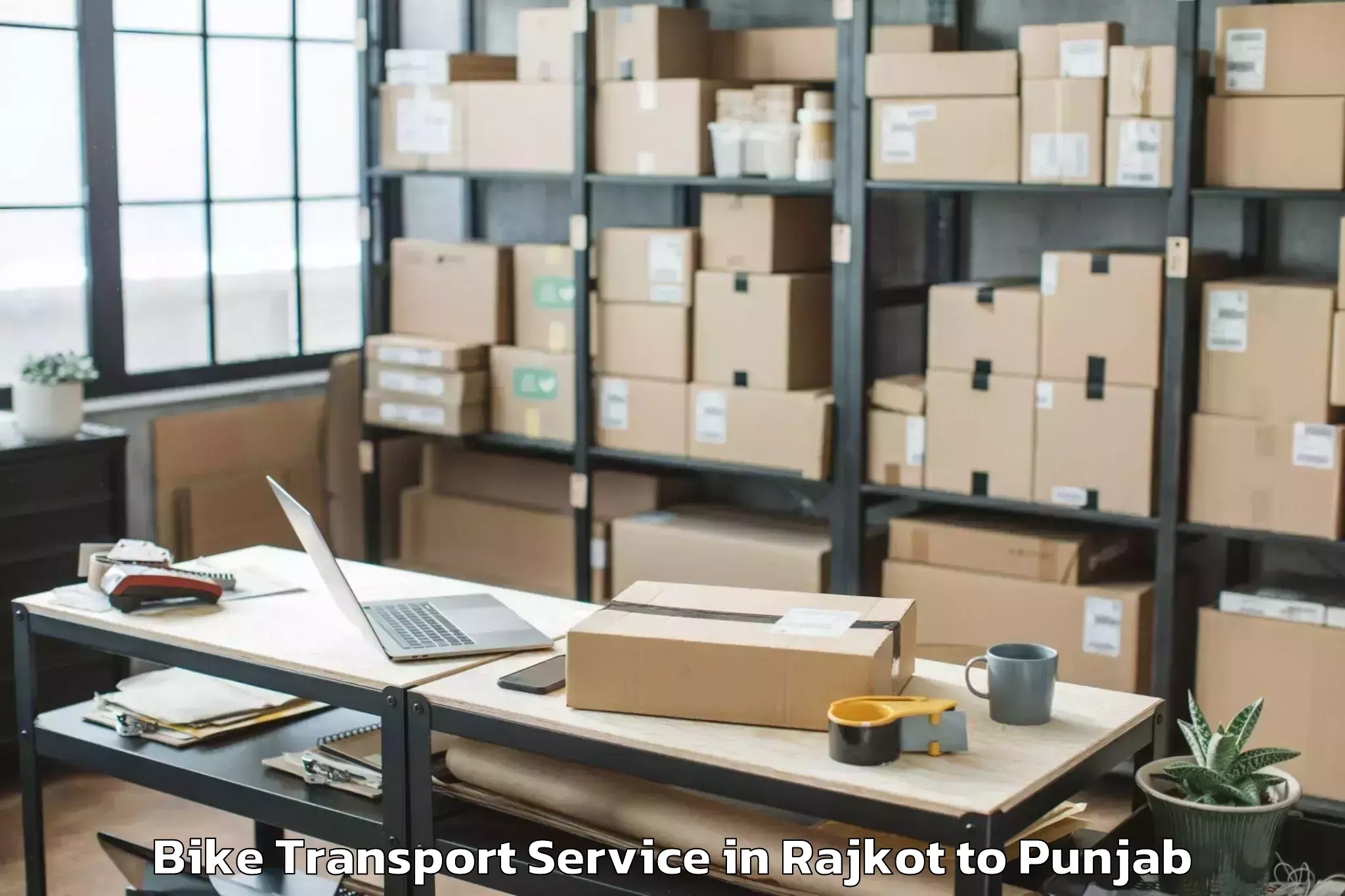 Expert Rajkot to Sri Guru Ram Das University Of Bike Transport